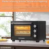 A black mini oven is shown on a kitchen counter, with baked goods inside. Text overlays describe its features. Podgląd zdjęcia produktu
