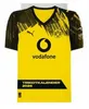 A yellow and black Borussia Dortmund football jersey with sponsor logos and text. Produktbild-Vorschau