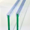 Close-up view of two shower door seals attached to glass panels. Anteprima dell’immagine prodotto