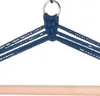 Close-up of the top of a blue hammock swing, showing the knotting and metal ring for hanging, with a wooden bar at the bottom. Produktbild-Vorschau