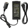 A black AC/DC power adapter with two cables attached, one with a car cigarette lighter plug and the other with a standard power plug. Produktbild-Vorschau