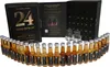 A display of a "24 Days of Rum" advent calendar, featuring small bottles of rum and two tasting glasses. Produktbild-Vorschau