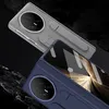 Two phone cases are shown, one gray and one blue, with a dark, textured background. Anteprima dell’immagine prodotto