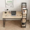A modern computer desk with integrated shelving, set against a plain wall and floor. Produktbild-Vorschau