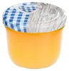 A glass jar filled with an orange substance, sealed with a lid featuring a blue checkered pattern and a wooden texture. Voir les images du produit
