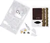A flat lay of unassembled parts for a Harry Potter 4D-Build Hedwig model, including printed sheets and smaller components. Produktbild-Vorschau