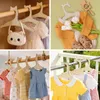 30 Baby-Kleiderbügel aus Holz, schlank, 23x12 cm, für Neugeborene & Kinder Productafbeelding-voorbeeld