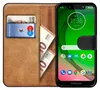 A book-style phone case with a Motorola Moto G7 Play phone inside, showing cards and euro banknotes in the case slots. Náhľad obrázku produktu