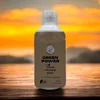 A bottle of Green Power Vegan Phosphor Boost is placed on a wooden surface with a blurred sunset background. Produktbild-Vorschau