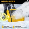 A person using a yellow snow blower in the snow, with a visual representation of the motor. Produktbild-Vorschau