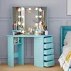 A light blue corner vanity table with a lighted mirror and drawers, placed next to a bed. Voir les images du produit