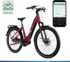 A red Zündapp e-bike is shown against a white background, with a smartphone displaying a navigation app next to it. Voir les images du produit