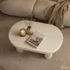 Ovaler Couchtisch MATE 85 cm Creme mit vier zylindrischen Produktbild-Vorschau 6