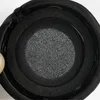 A close-up view of a black headphone earpad. Náhľad obrázku produktu
