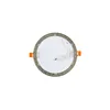 The back of a round, flat LED recessed light fixture with orange spring clips visible. Produktbild-Vorschau
