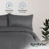 A close-up view of a grey striped duvet cover and pillowcase set, with marketing icons and text in the background. Produktbild-Vorschau