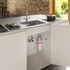 A modern kitchen sink area with a faucet, water filter, and cooking pot. Anteprima dell’immagine prodotto