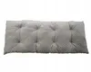 A gray tufted cushion on a white background. Produktbild-Vorschau