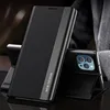 A black flip case for a smartphone is shown in a studio setting, with the phone partially visible inside. Produktbild-Vorschau