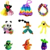 A collage of nine different small, colorful loom band creations. Podgląd zdjęcia produktu