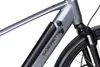 A close-up view of an electric bicycle's frame, showing the battery pack and part of the front fork and wheel. Produktbild-Vorschau