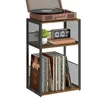 A three-tiered shelf unit with a record player on top, a digital clock and books on the middle shelf, and vinyl records on the bottom shelf. Náhled obrázku produktu