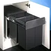A pull-out double bin system installed inside a white cabinet. Podgląd zdjęcia produktu