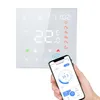 A smart thermostat is shown on a white background, with a hand holding a smartphone displaying the thermostat's app. Produktbild-Vorschau