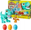 A Play-Doh Dino T Rex toy set with Play-Doh eggs and accessories, displayed with its packaging. Náhled obrázku produktu