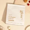 A pouch of collagen powder is placed on a light-colored surface, with some food items like a croissant and raspberries in the background. Produktbild-Vorschau