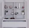 A white vanity table with shelves and a drawer, displaying various cosmetic and decorative items. Voir les images du produit