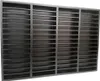 A dark, grid-like shelf unit. Produktbild-Vorschau
