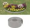A garden bed with colorful flowers and a roll of gray edging. Produktbild-Vorschau