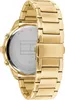 A close-up side view of a gold Tommy Hilfiger watch. Produktbild-Vorschau