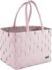 A pink woven basket with handles on a white background. Produktbild-Vorschau