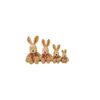 Four plush bunny toys of varying sizes are sitting in a row against a white background. Produktbild-Vorschau