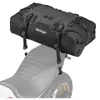 A black Kriega motorcycle tail bag is mounted on a grey motorcycle seat. Náhľad obrázku produktu