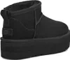 A black UGG boot with a platform sole is shown from the side against a white background. Voir les images du produit