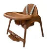 A brown plastic high chair for toddlers is shown against a white background. Produktbild-Vorschau