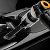 A handheld vacuum cleaner is being used to clean the interior of a car. Produktbild-Vorschau