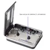 An open portable cassette player with internal components visible, indicating where to insert batteries. Voir les images du produit
