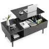 A black lift-top coffee table with a laptop, coffee cup, and decorative items on display. Voir les images du produit