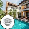 A skimmer basket is shown in the foreground, superimposed over a luxurious outdoor swimming pool area with a modern villa in the background. Produktbild-Vorschau