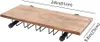 A wooden shelf with black metal racks underneath, designed to hold wine glasses. Voir les images du produit
