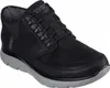 A black Skechers sneaker with a gray sole, shown from a side-angle. Náhled obrázku produktu