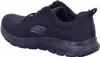 A black Skechers shoe is shown from a side-angle. Voir les images du produit