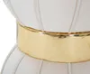Close-up view of a cream-colored tufted stool with a gold band around the middle. Anteprima dell’immagine prodotto