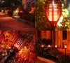 Collage of solar garden lights in various settings, showing their flame effect. Náhled obrázku produktu