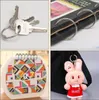 A collage of four images showing different items: keys on a ring, a binder with rings, a small calendar, and a plush bunny keychain attached to a bag. Produktbild-Vorschau