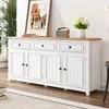 A white sideboard with a wooden top, placed in a room with a plant and a picture on the wall. Anteprima dell’immagine prodotto